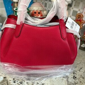 !NEW!  

Beautiful! Kate spade!

CHERRY RED! 

LARGE! 
dumpling satchel.